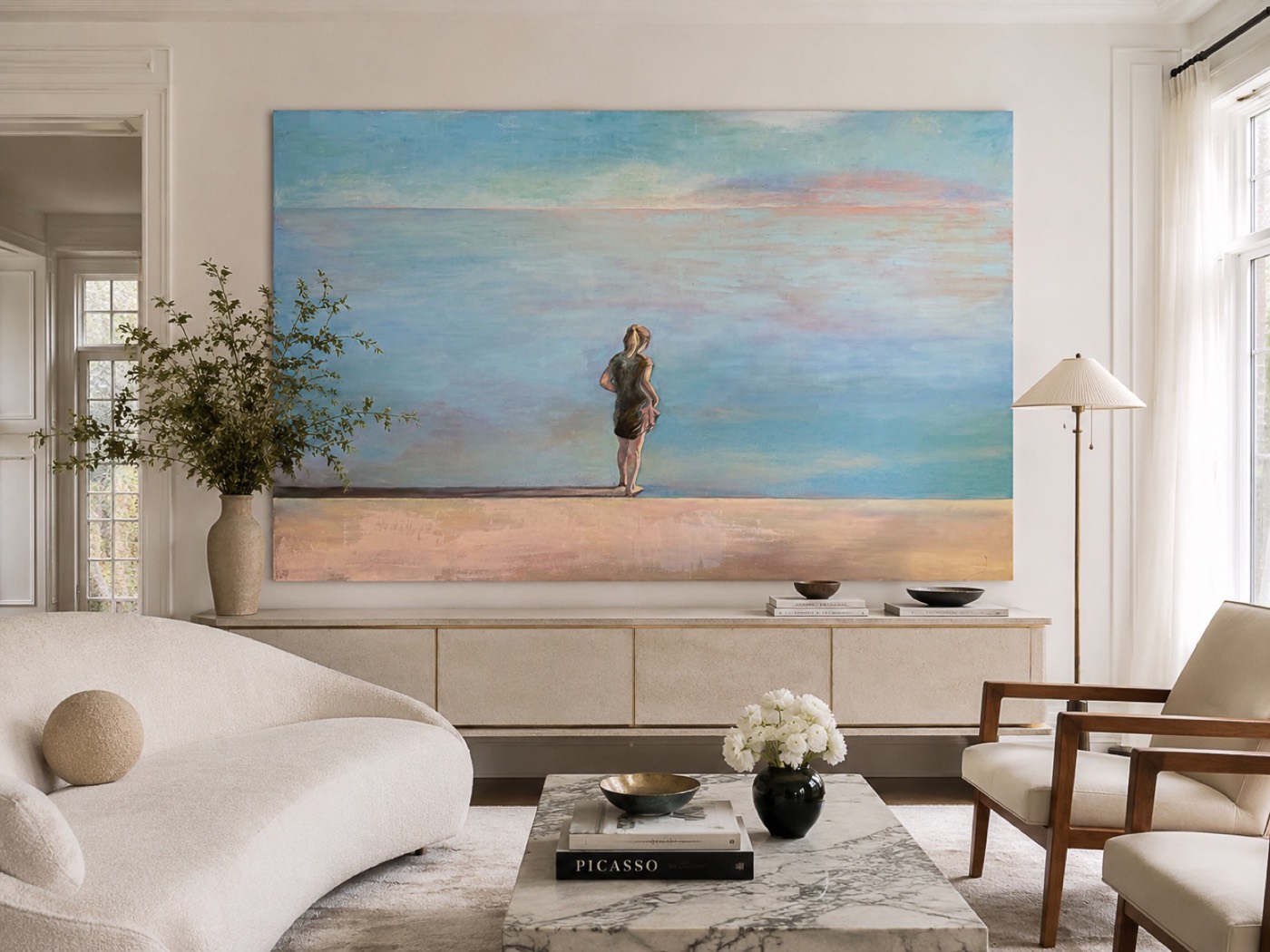 Oil painting of a lone figure at the shore in a bright living room